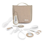 Béaba Trousse de toilette/kit de soin - Beige | Thermomètre de bain, ciseaux, coupe-ongles, brosse, anneau de dentition, mouche-bébé et lime à ongles