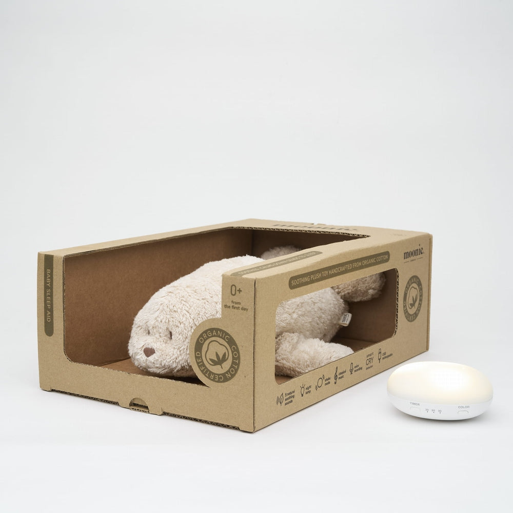 Moonie Peluche - The Humming Seal Organic 2.0 - Sable naturel | Phoque à bruit blanc avec veilleuse