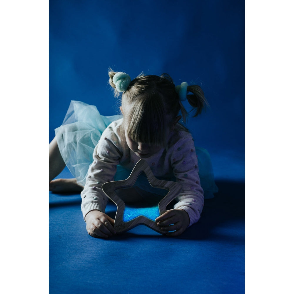 Petit Boum étoile sensorielle Orionis avec effet phosphorescent