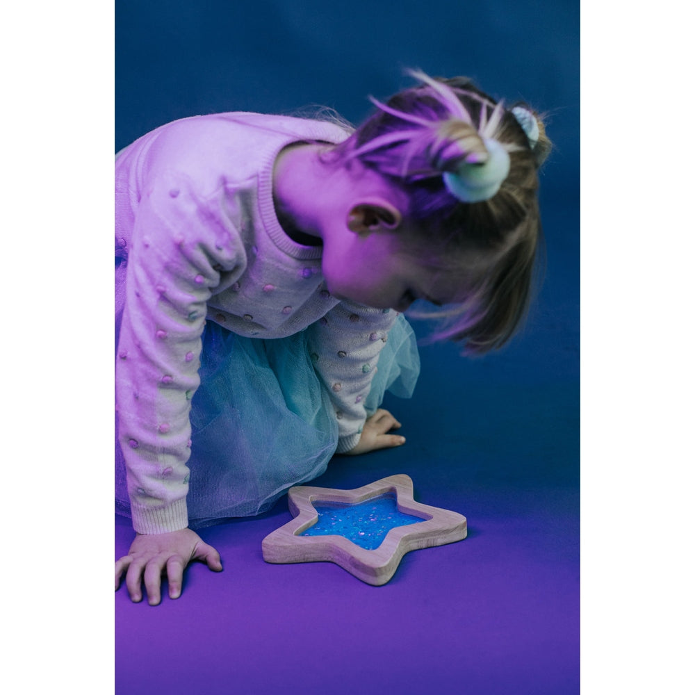 Petit Boum Étoile sensorielle Orionis avec effet phosphorescent