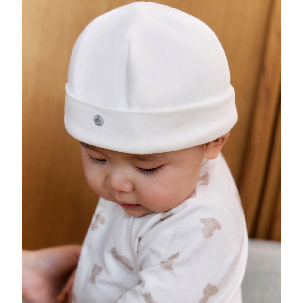Bonnet de naissance Petit Bateau en bouclé velouté