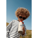 Lunettes de soleil Liewood Darla pour enfants 4-10 ans - Bleu transparent Whale