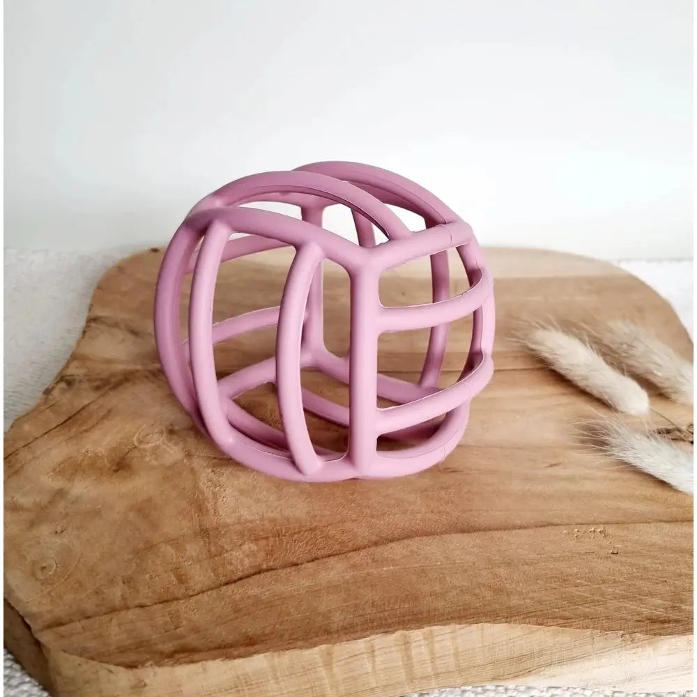 Balle de motricité flexible en silicone - rose poudré
