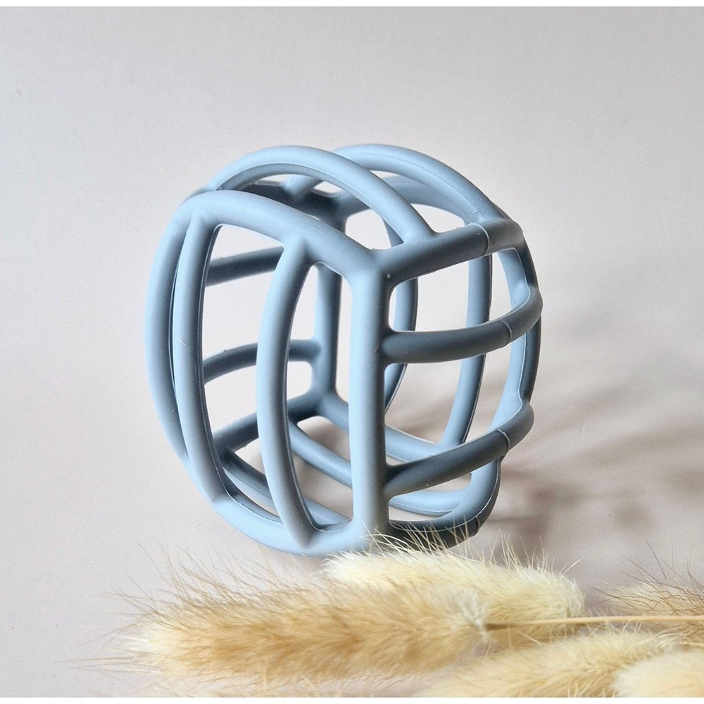 Rammelaartje Balle de motricité souple en silicone - bleu grisé