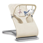 Ergobaby transat Evolve 3-en-1 avec arche de jeu - Crème