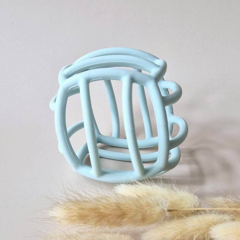 Rammelaartje Balle de motricité flexible en silicone - bleu clair