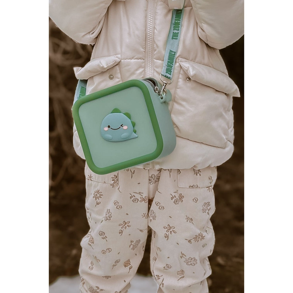 Le sac pour appareil photo en silicone Zoofamily - Dino