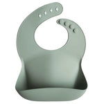 Bavoir en silicone Mushie - bleu Cambridge