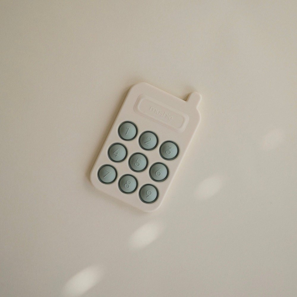 PRESS-TOY TÉLÉPHONE - BLEU CAMBRIDGE
