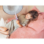 Fauteuil pouf rose en forme de haricot